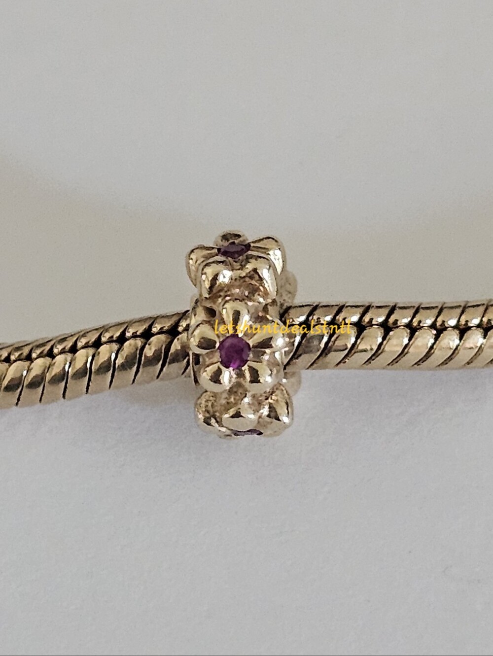 Pandora 14K Gold Flower Spacer with Ruby. 750436RU.